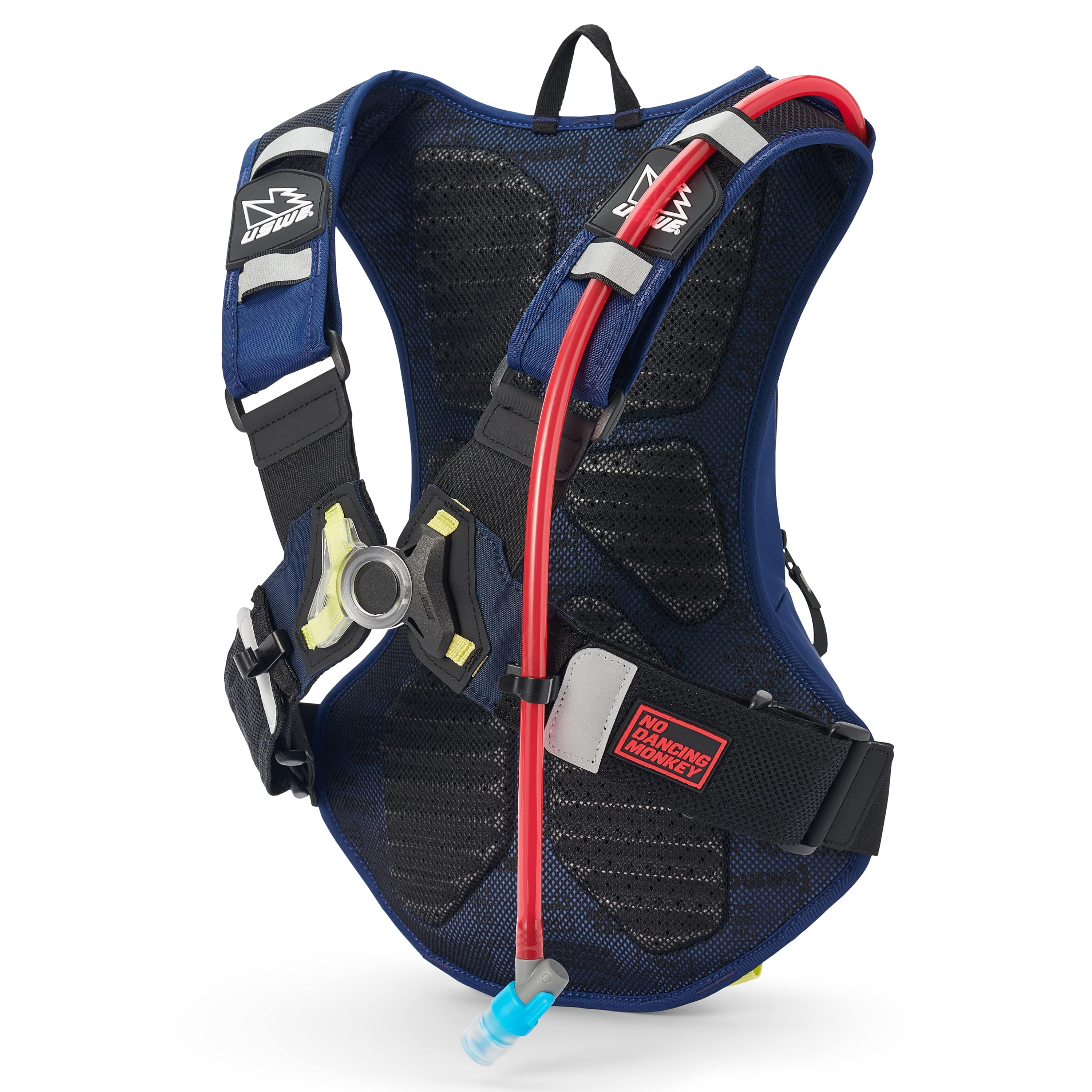 USWE Moto Hydro 12L hydration pack back panel view showing black mesh construction with blue trim, red No Dancing Monkey logo patch on lumbar strap, integrated red hydration hose routing, and yellow Plug-n-Play bladder connector on left shoulder strap.
