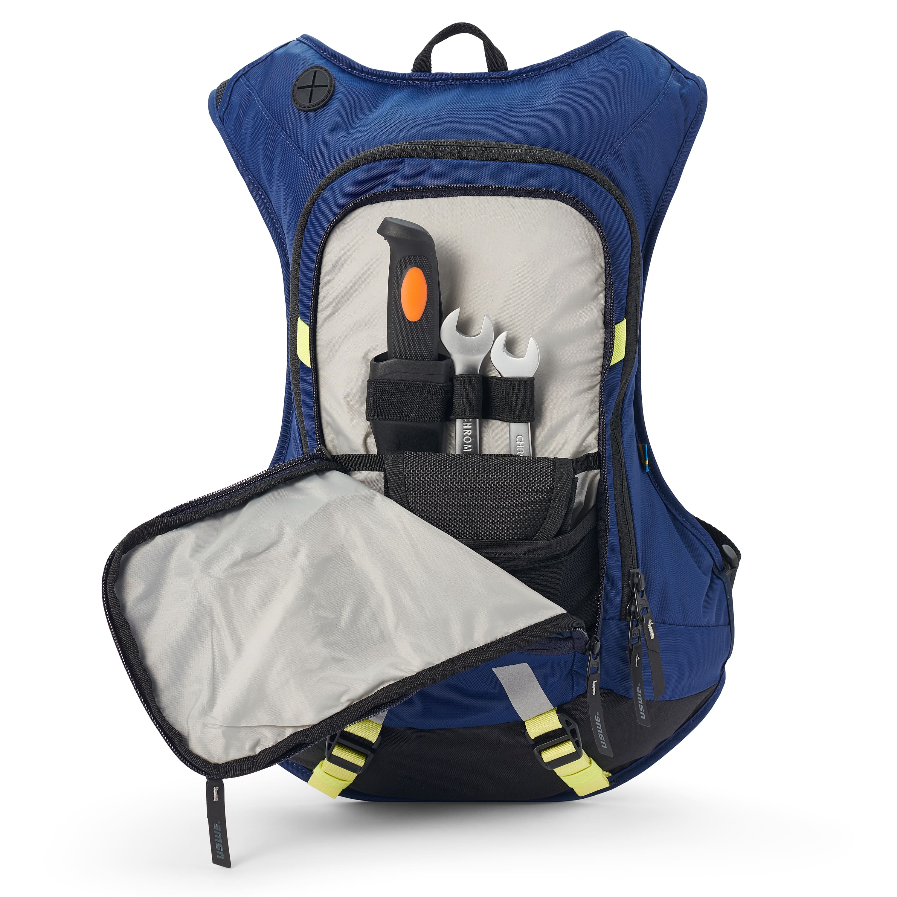 USWE Moto Hydro 12L hydration pack in navy blue with yellow harness straps, shown with main compartment open to display internal tool organizer holding screwdriver and wrenches in elastic loops against gray interior lining.