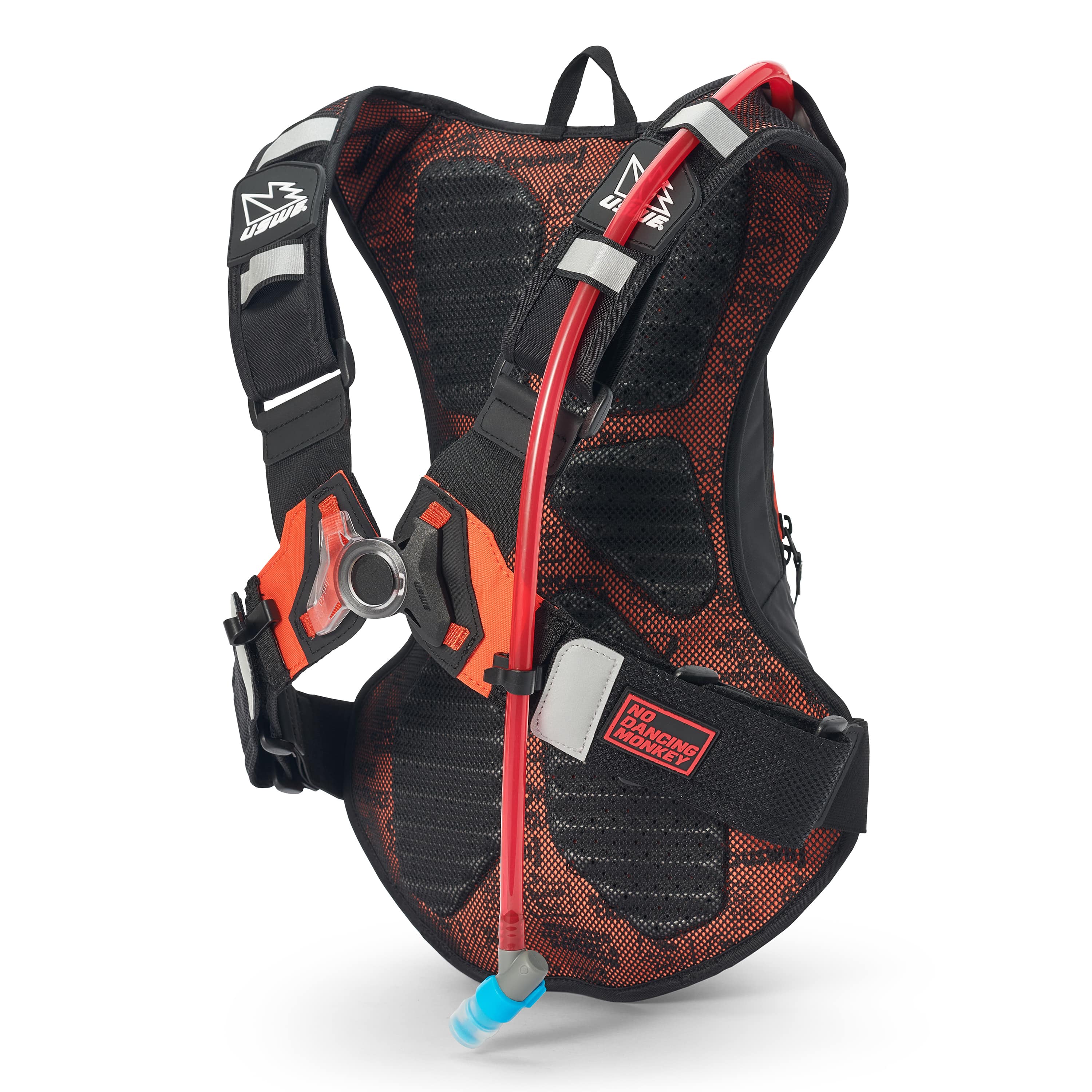 USWE Moto Hydro 8L hydration pack rear view showing black and orange mesh ventilation panel with molded foam padding, elastic NDM shoulder harness with reflective gray straps, red hydration hose secured through strap clips, and orange waist belt buckle with No Dancing Monkey logo patch for breathable dirt bike riding comfort.