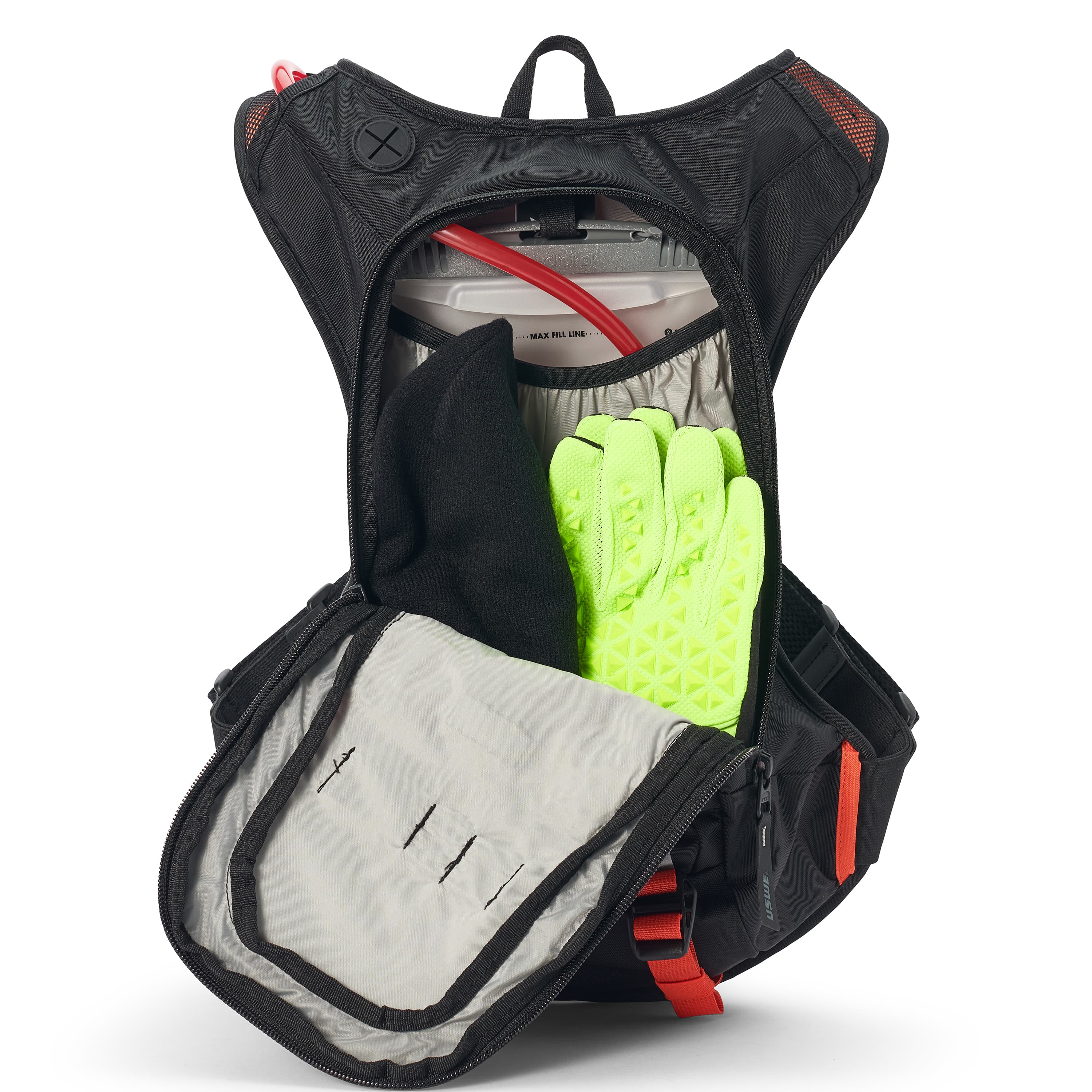 USWE Moto Hydro 8L hydration pack in black with orange mesh shoulder panels, fully opened to reveal 3.0L Elite Hydration Bladder with red hose, neon yellow riding gloves, black mesh bottle holder, and gray interior lining with elastic gear loops for dirt bike storage capacity.