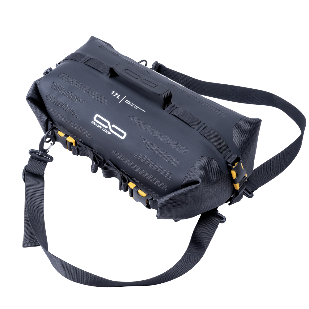 Black waterproof bag with a strap on a white background