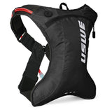 USWE OUTLANDER Moto 2L hydration pack in black with red hydration tube, featuring No Dancing Monkey 4-point harness system and ultralight ripstop construction for dirt bike and enduro riding.