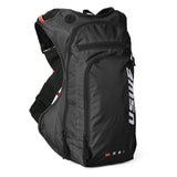 USWE OUTLANDER Moto 9L motorcycle hydration pack in Black colorway with white vertical logo branding, ripstop fabric construction, and red hydration tube visible on elastic shoulder harness.