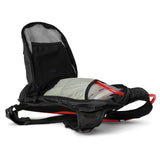 USWE OUTLANDER Moto 9L hydration pack in Black with main compartment fully unzipped revealing 3L Elite bladder with red cap nestled inside spacious cargo area with black mesh divider and gray interior lining.