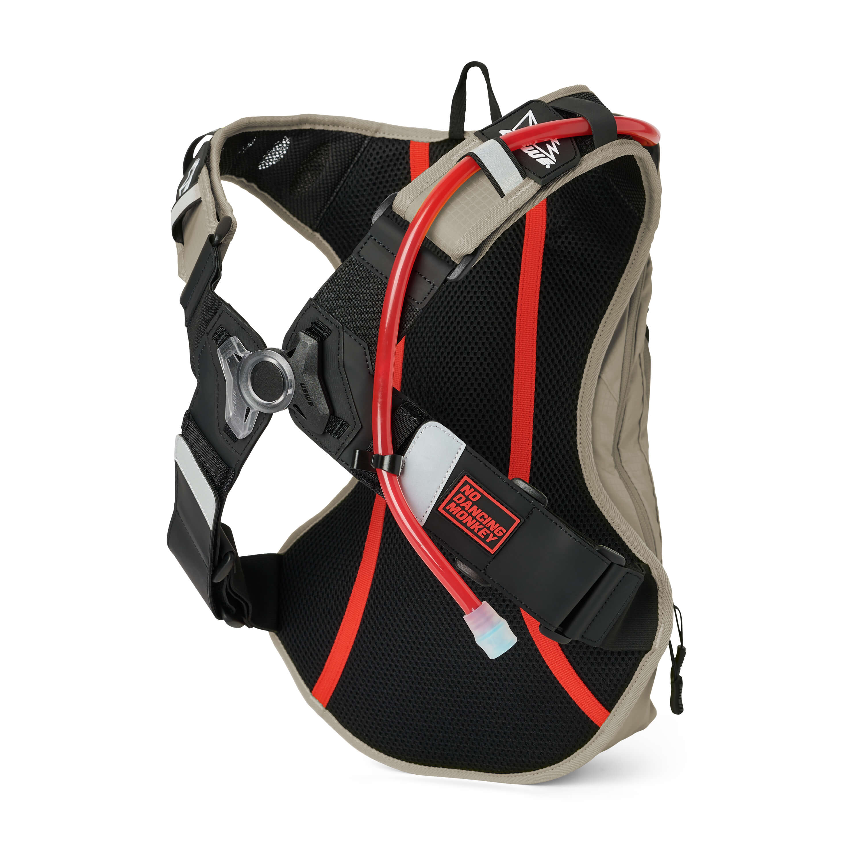 USWE OUTLANDER Moto 9L hydration pack in Sand colorway shown from rear angle highlighting black mesh back panel with red elastic NDM harness straps, hydration tube routing with bite valve, and adjustable chest buckle system for bounce-free stability.