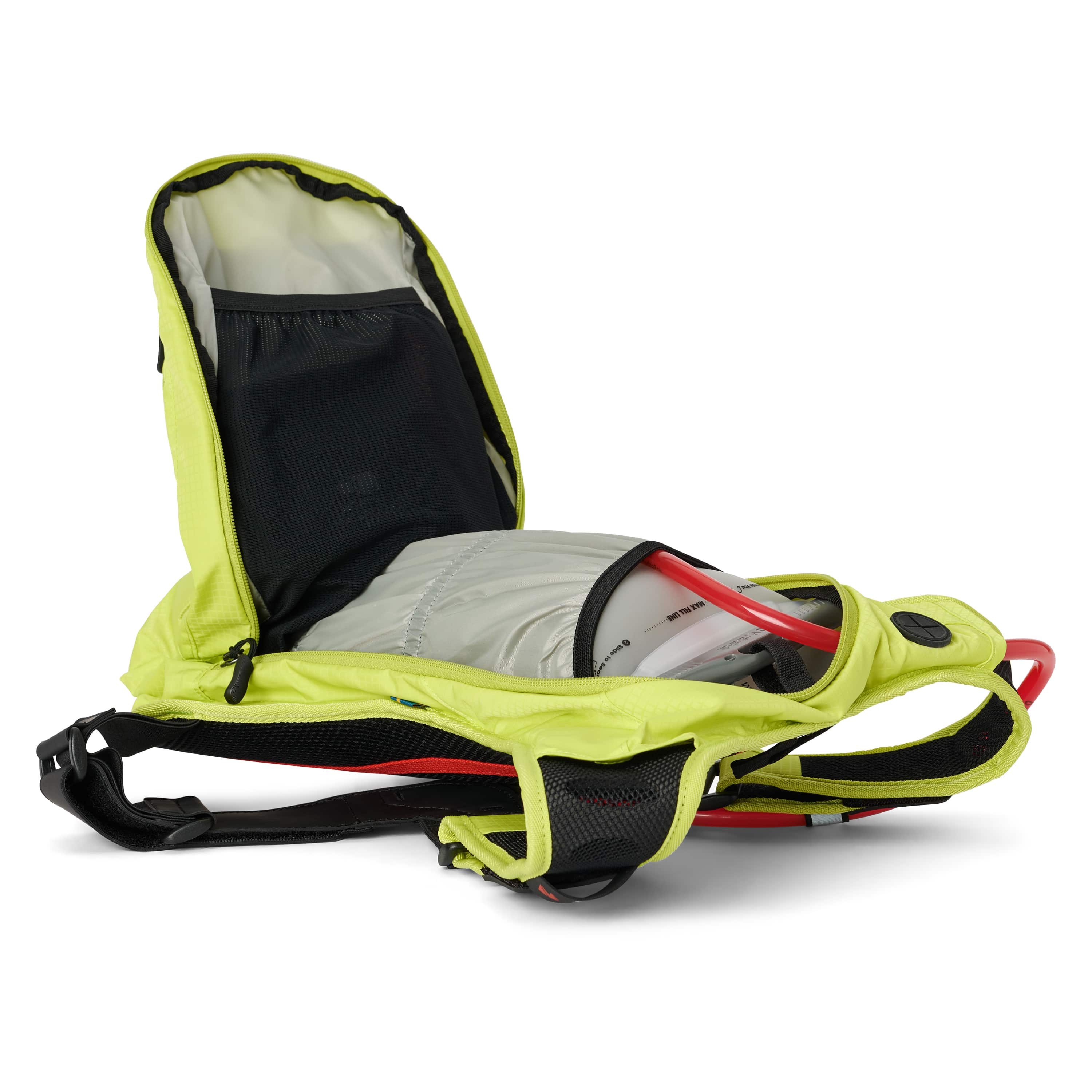 USWE OUTLANDER Moto 9L hydration pack in Crazy Yellow laid flat with main compartment open revealing 3L Elite bladder with red cap, black mesh divider pocket, and elastic NDM harness straps visible.