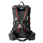 USWE VST Termocell Winter Harness with insulated shoulder strap pockets and red elastic straps shown on black hydration backpack from rear view. The Termocell thermal insulation system features body heat trapping pockets along both shoulder straps to prevent hydration tube freezing in cold weather conditions.